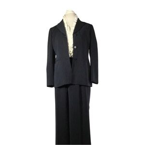 Three piece navy blue pinstripe suit
